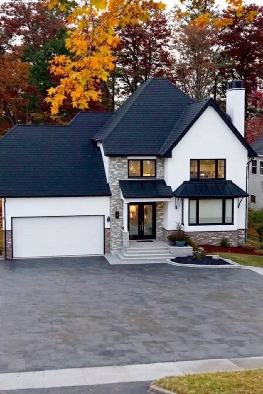 White house with eye-catching black trims and large driveway