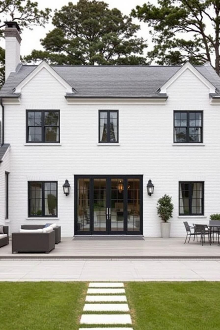 Elegant Georgian home with black window frames and white facade