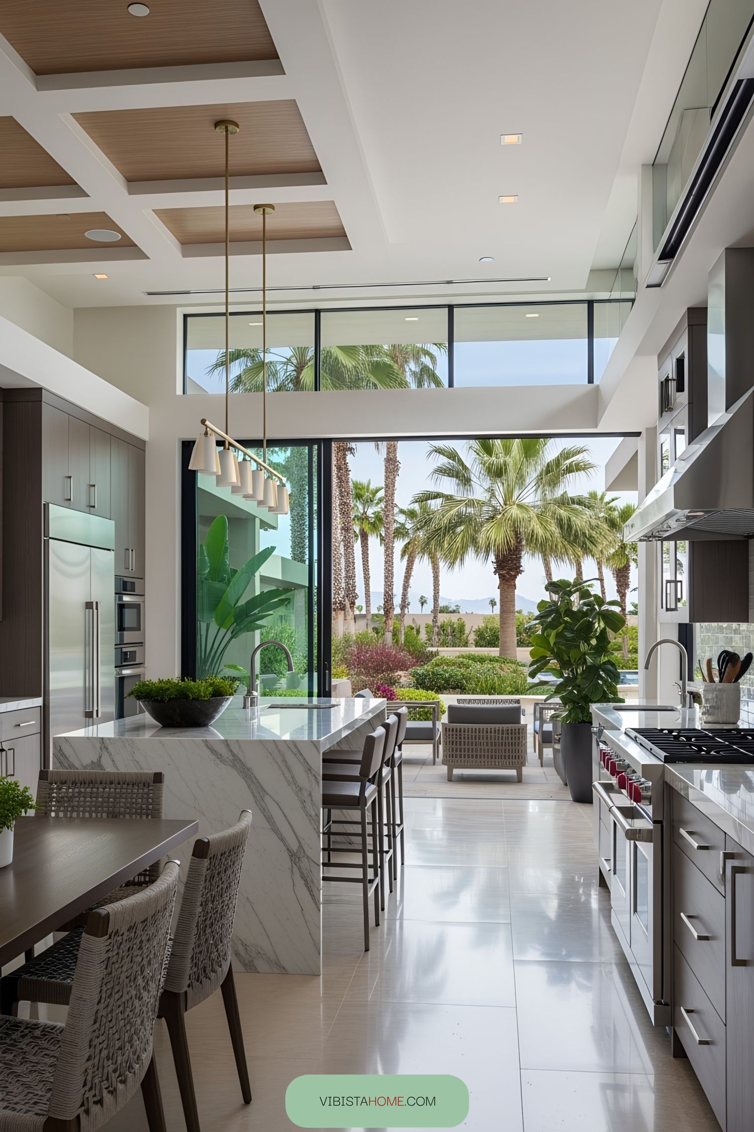 Luxurious kitchen opening to a tropical view