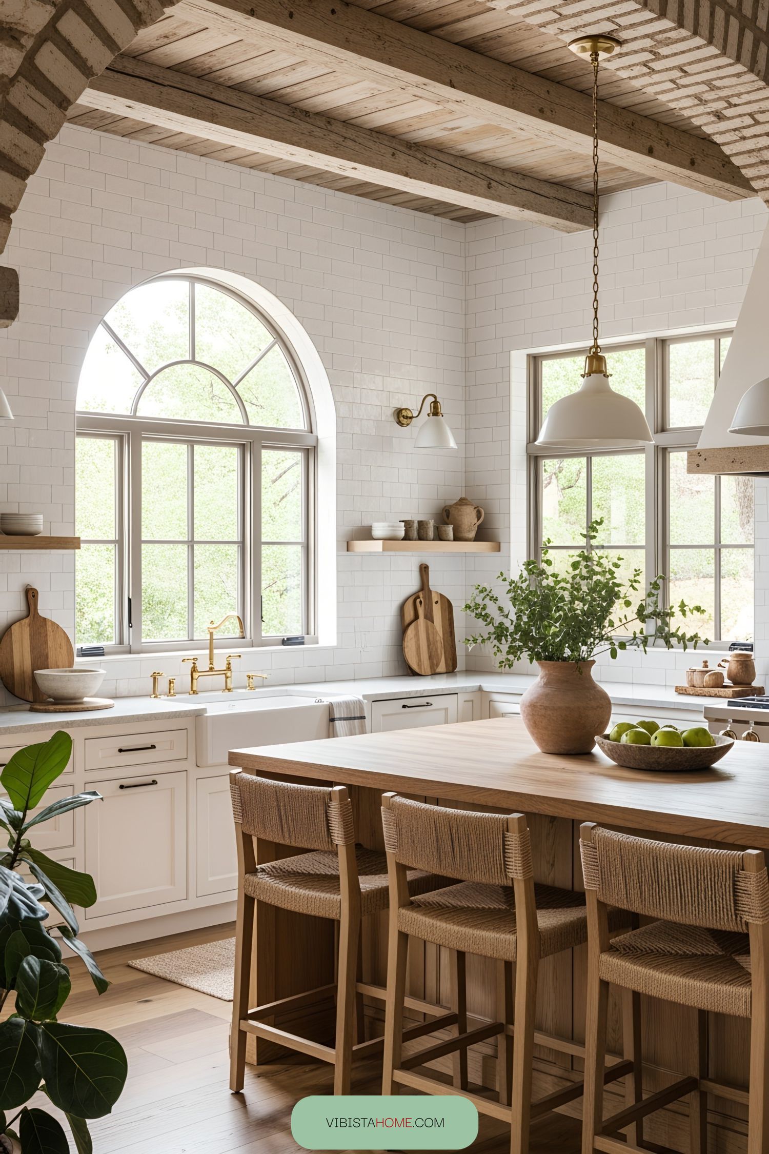 Spanish kitchen with wood beams and bright lighting