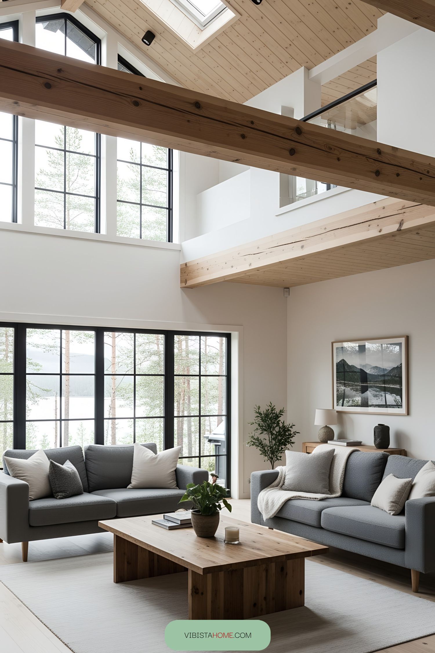 Spacious living room with large windows and wood accents