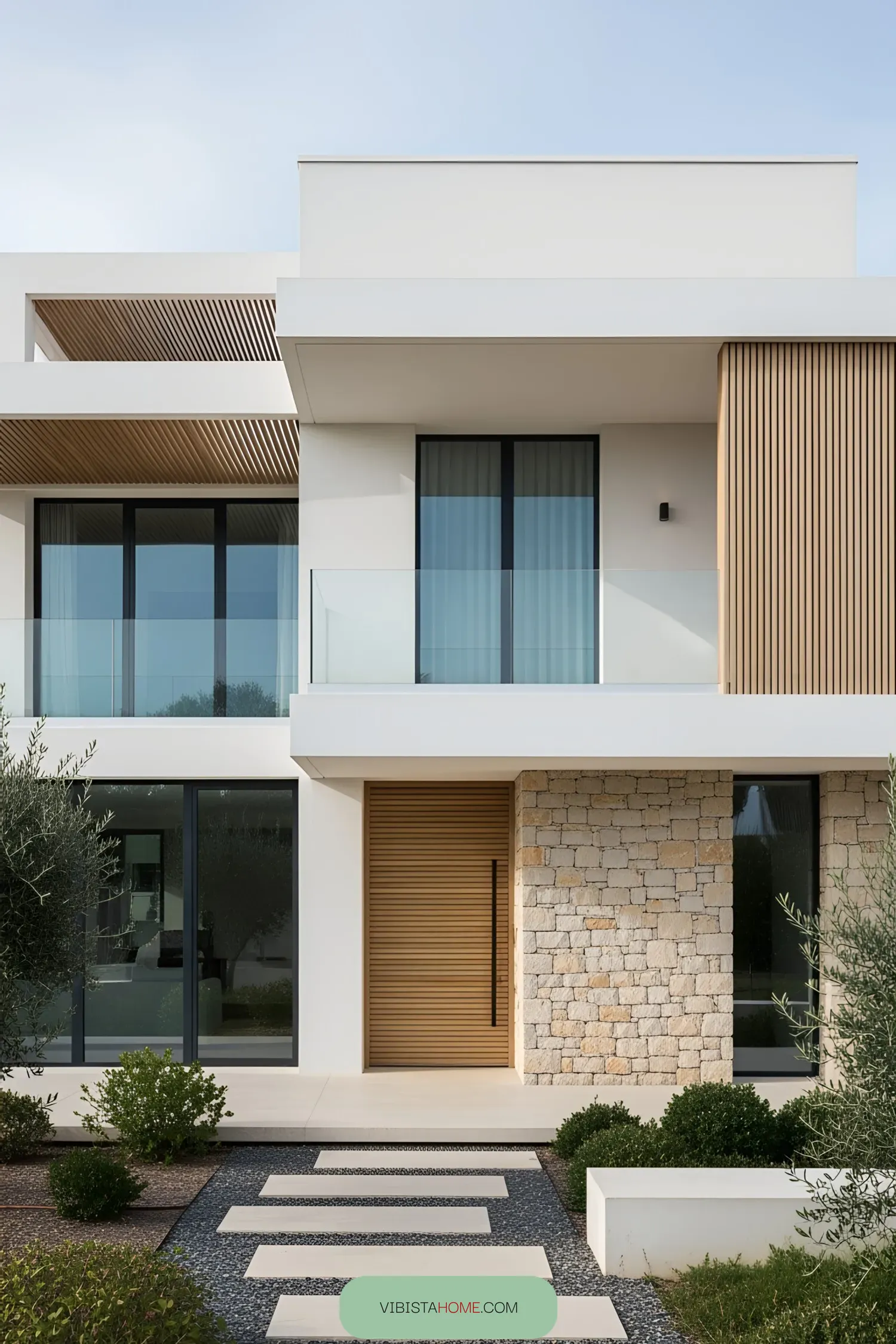 Modern coastal house with stone and wood elements
