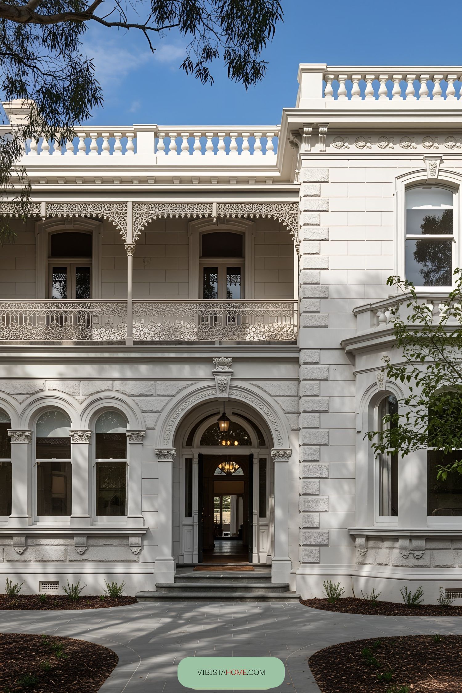 Grand Victorian villa with ornate facade and balcony
