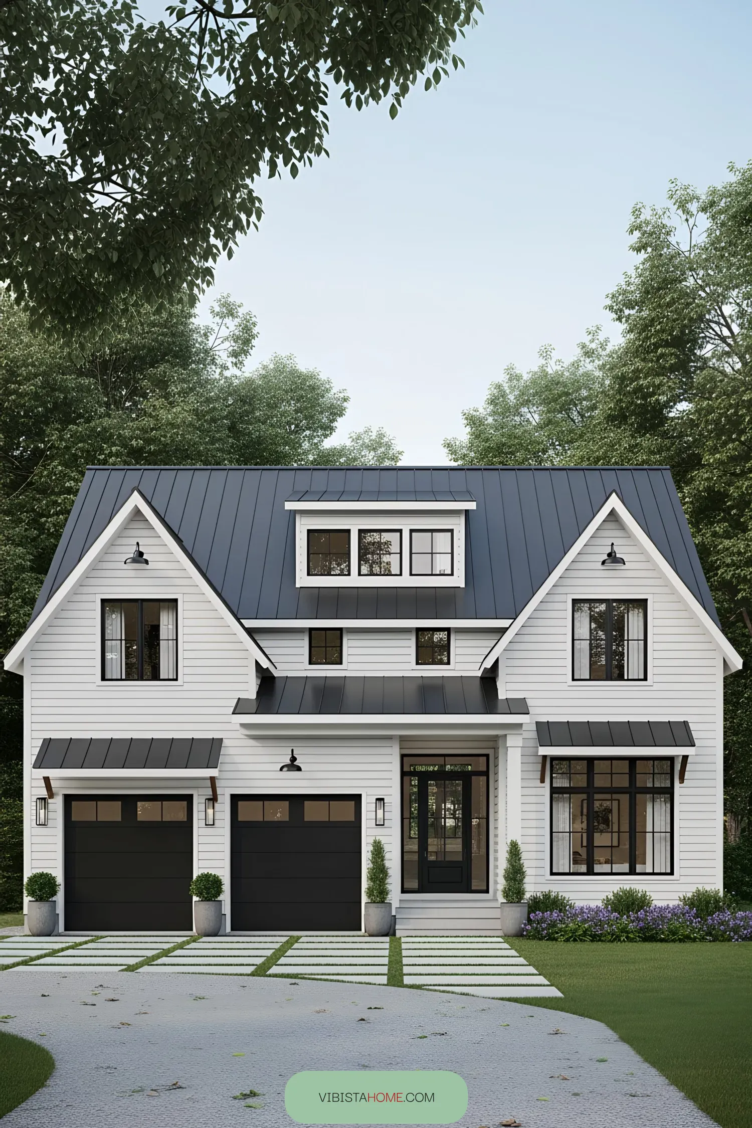 Charming white farmhouse with dual garages