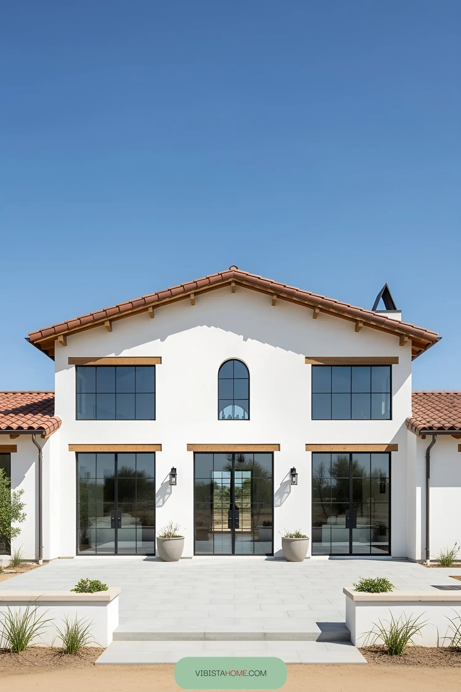 Contemporary farmhouse with white walls and terracotta roof