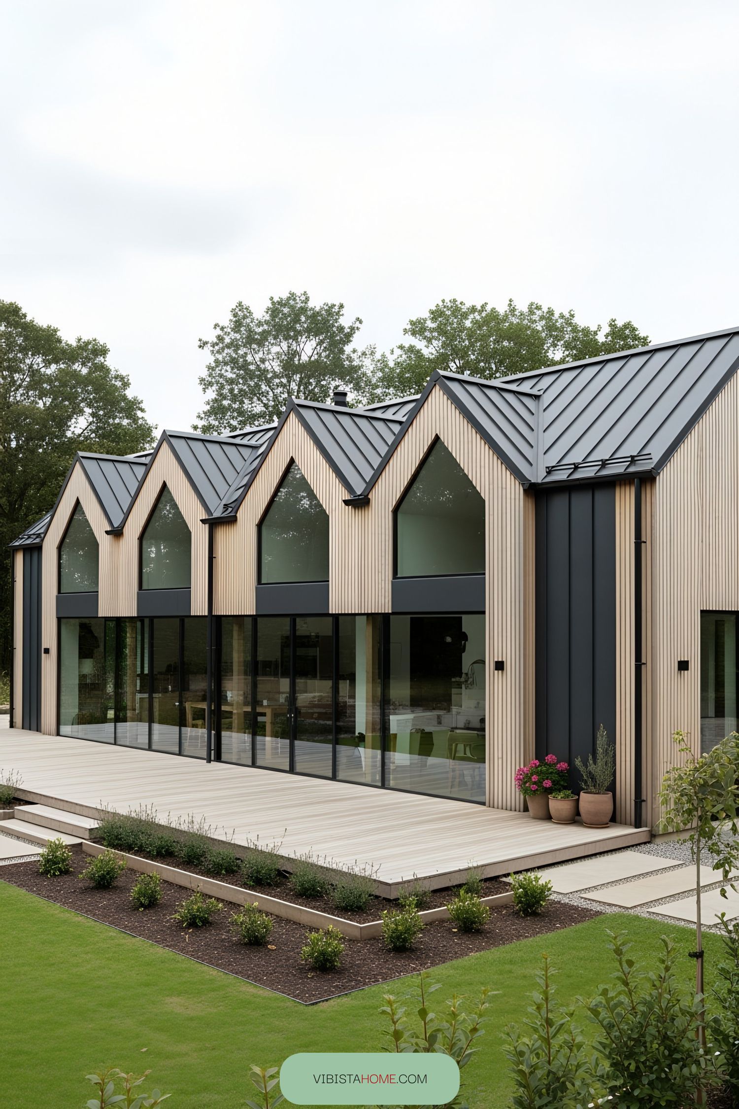 Sleek Scandinavian farmhouse with distinctive gabled roof