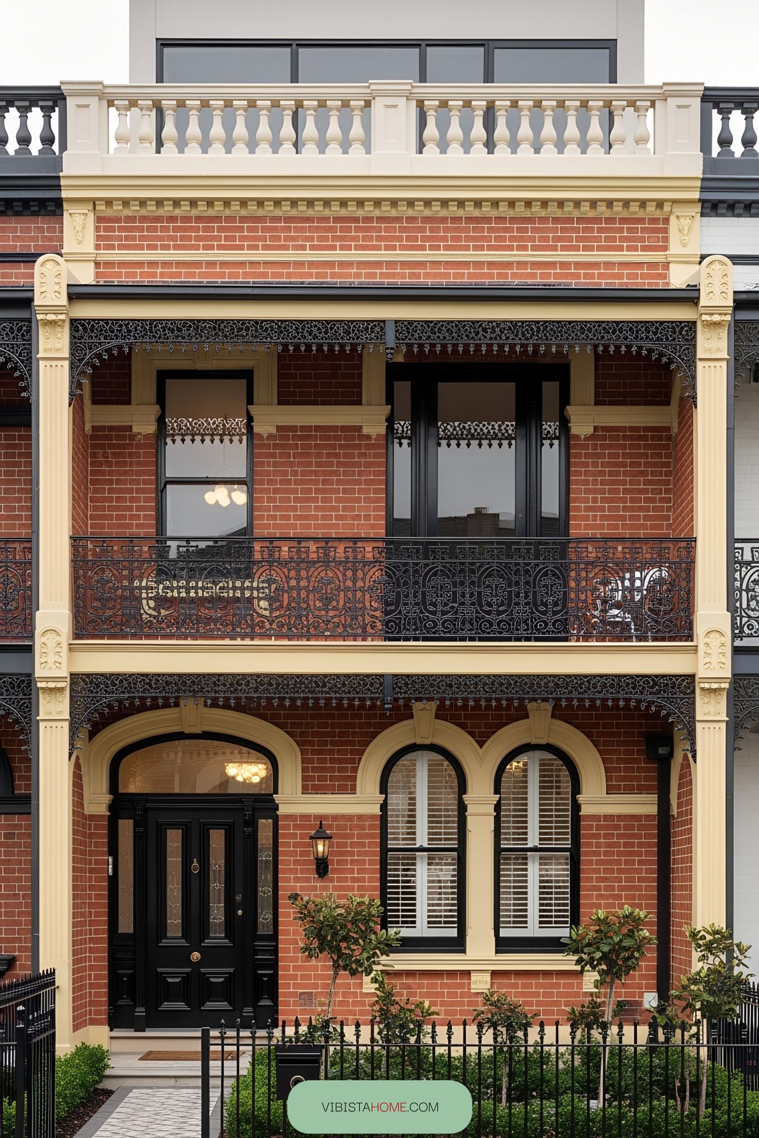 Victorian terrace with ornate ironwork and vibrant bricks