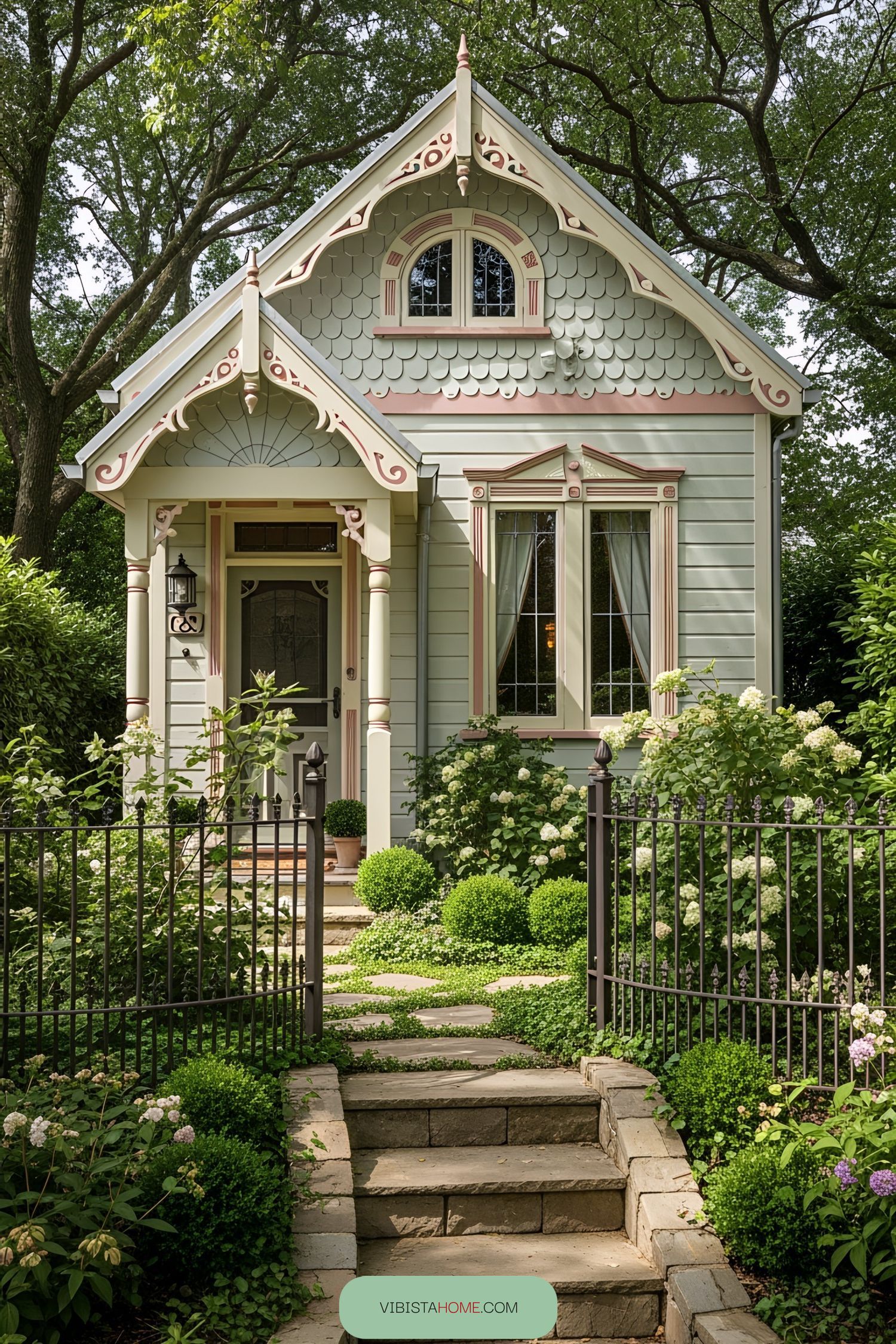 Charming tiny Victorian house with ornate details and a lush garden