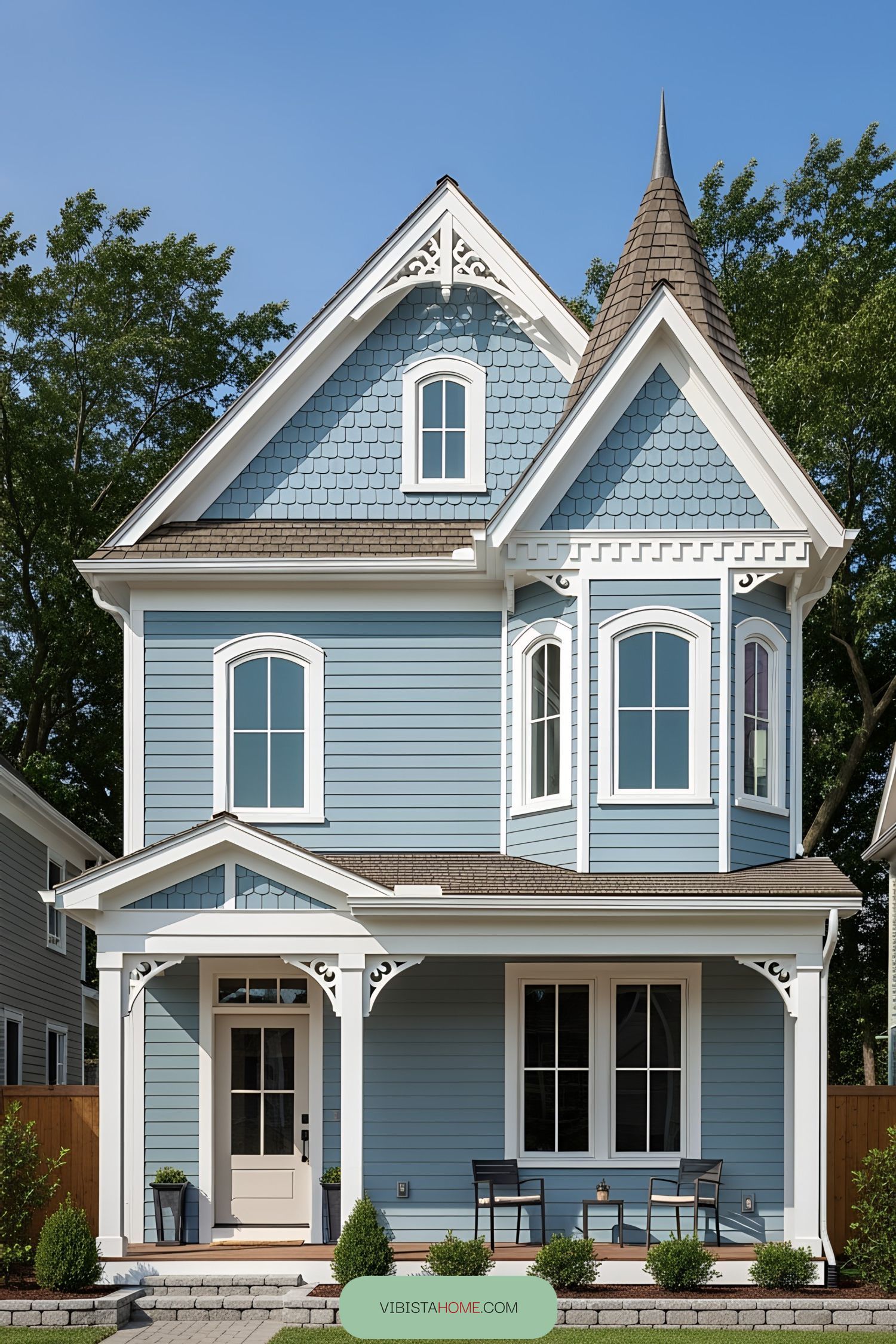 Quaint blue Victorian house with turret