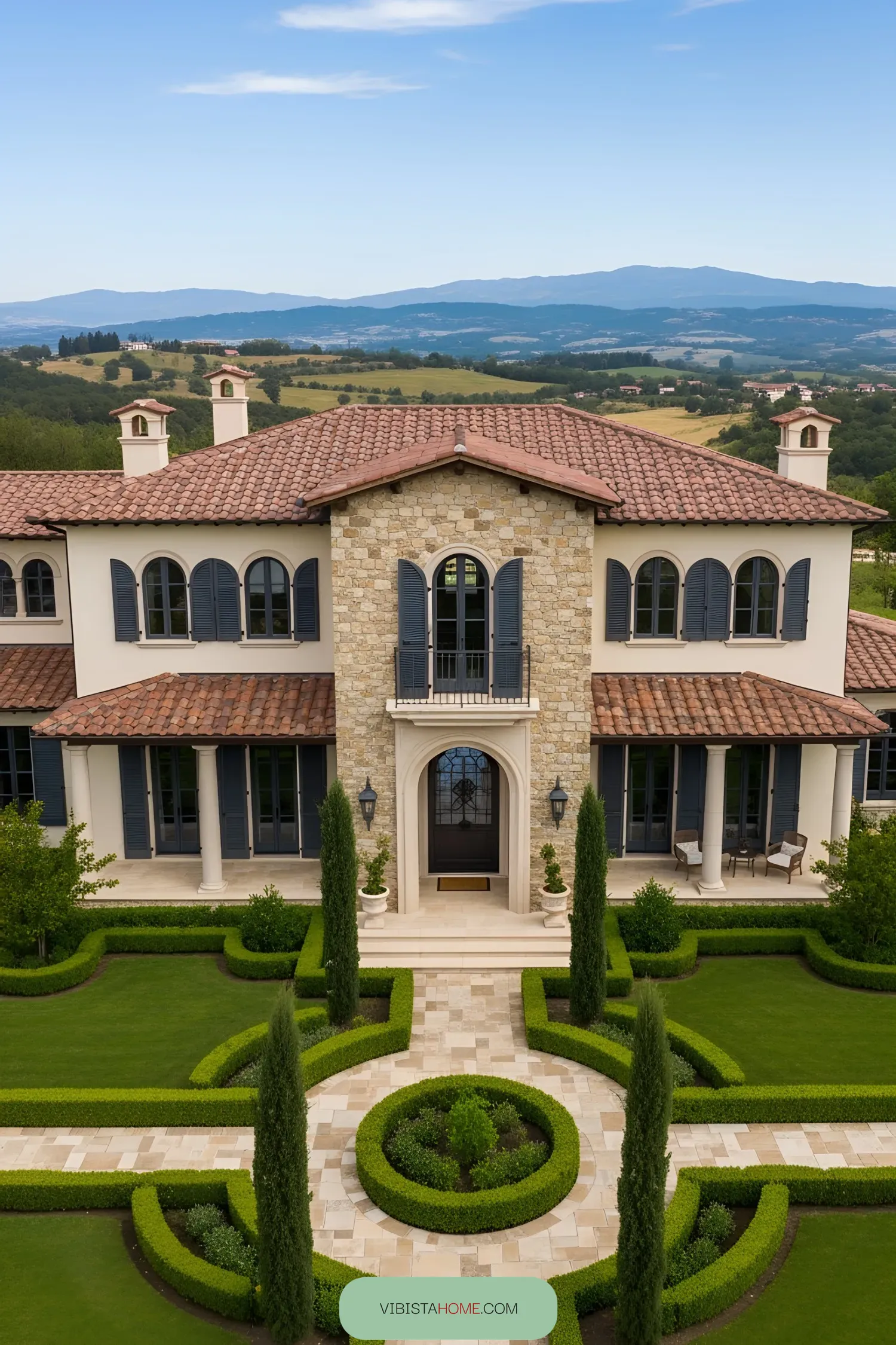 Modern Tuscan villa with stone facade and lush garden