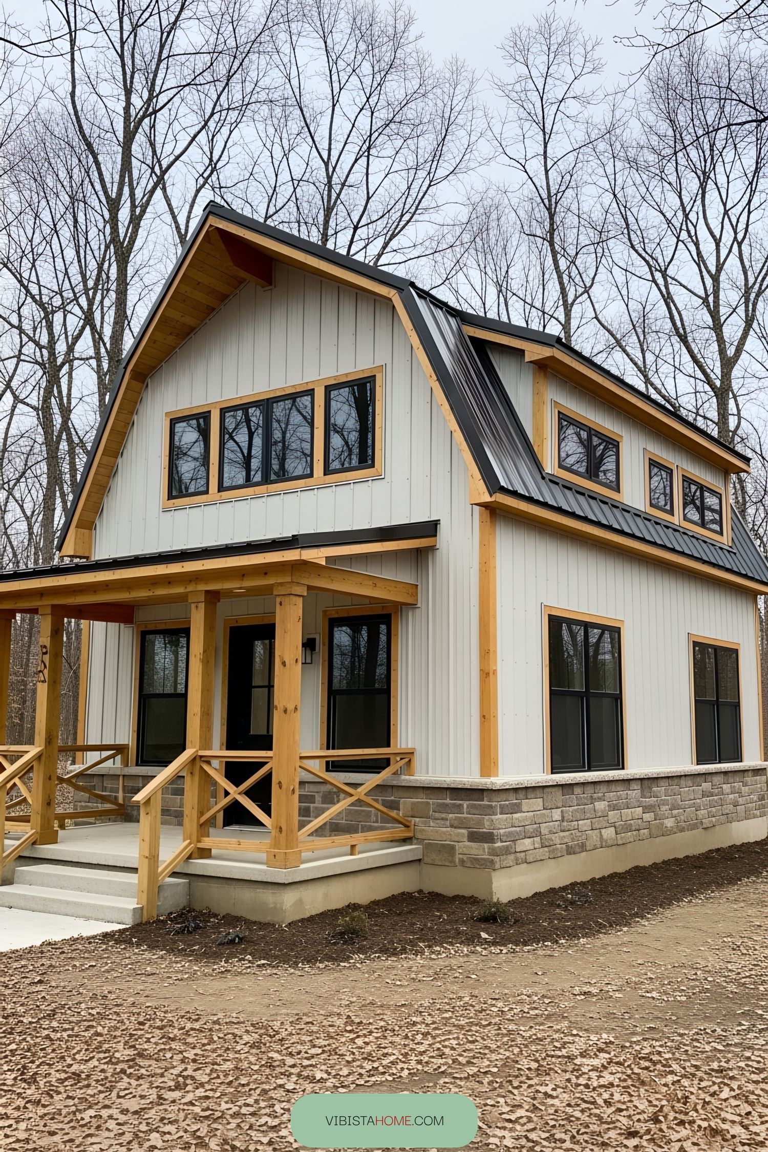 Compact barn-style house with a wooden porch