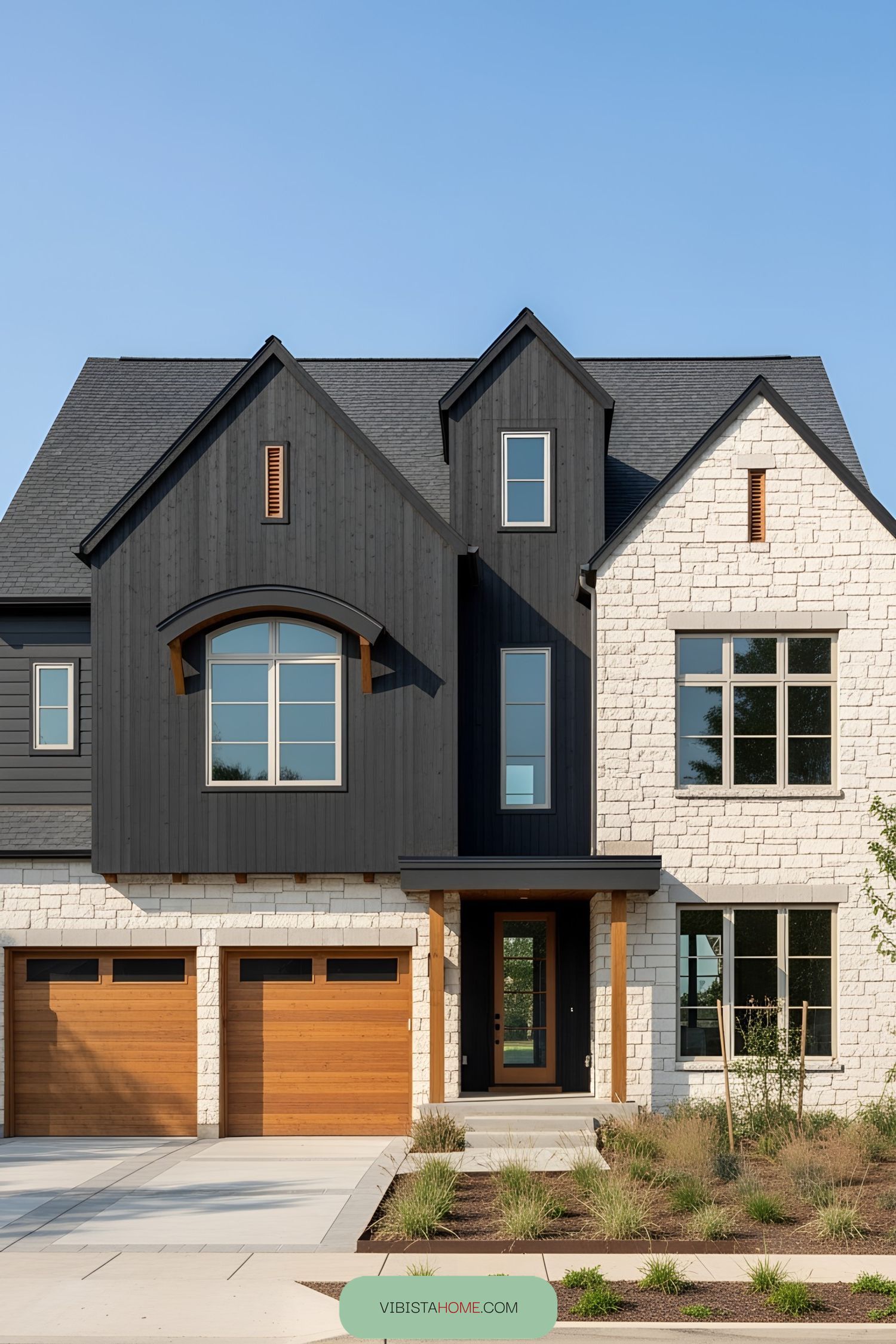 Modern house with black and stone facade