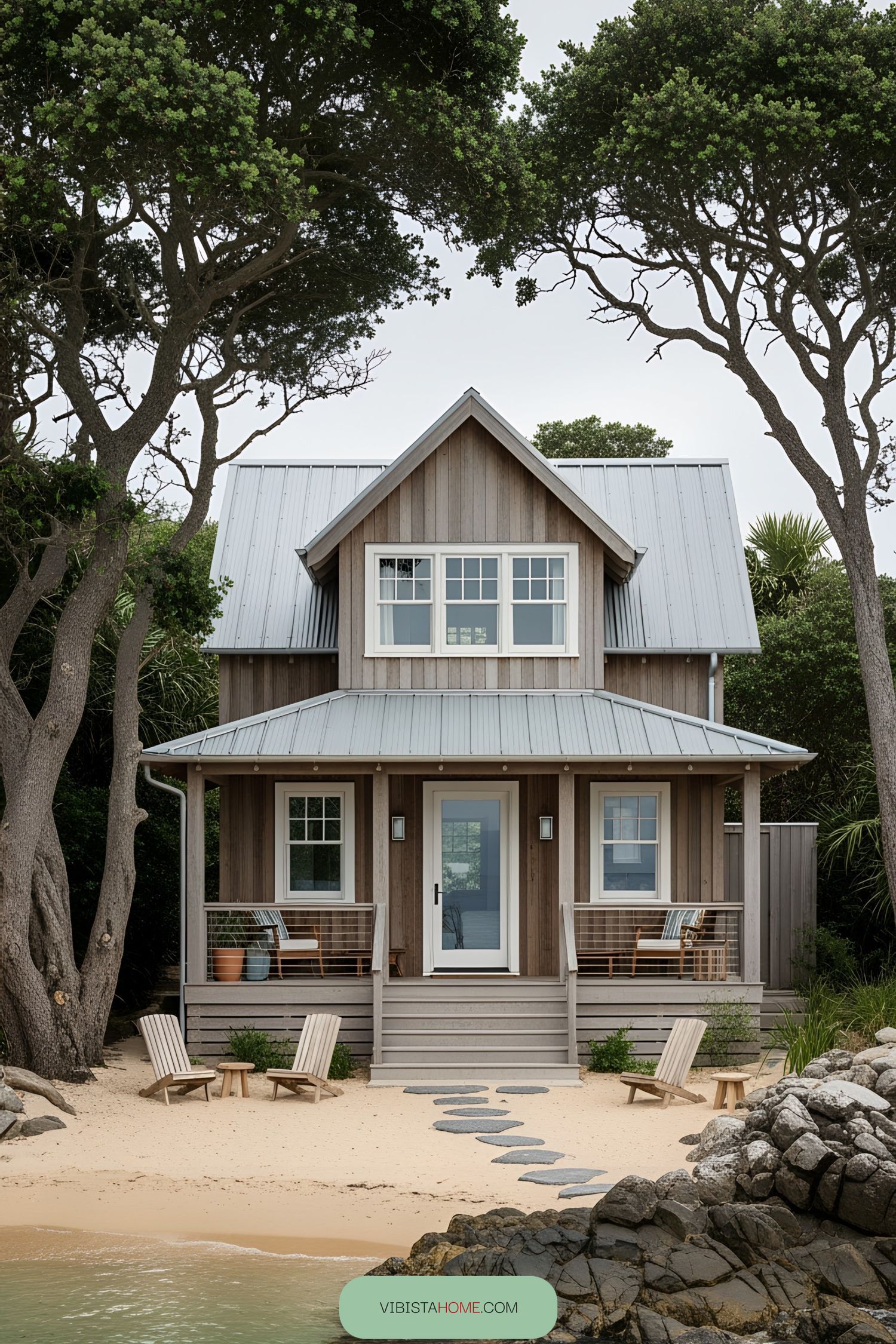 Cozy beach house nestled between trees and rocks