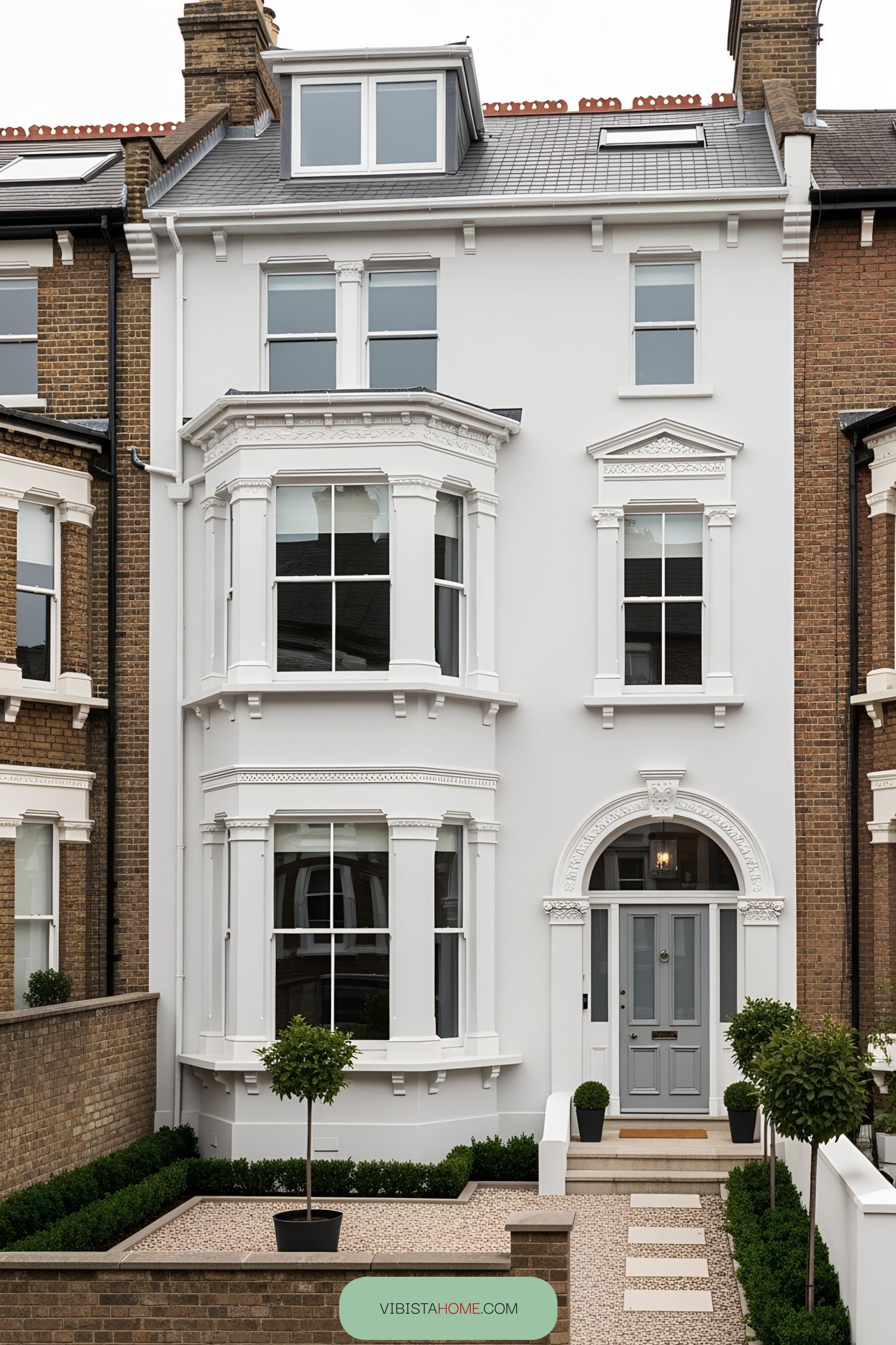Classic Victorian terrace house with bay windows and ornate details