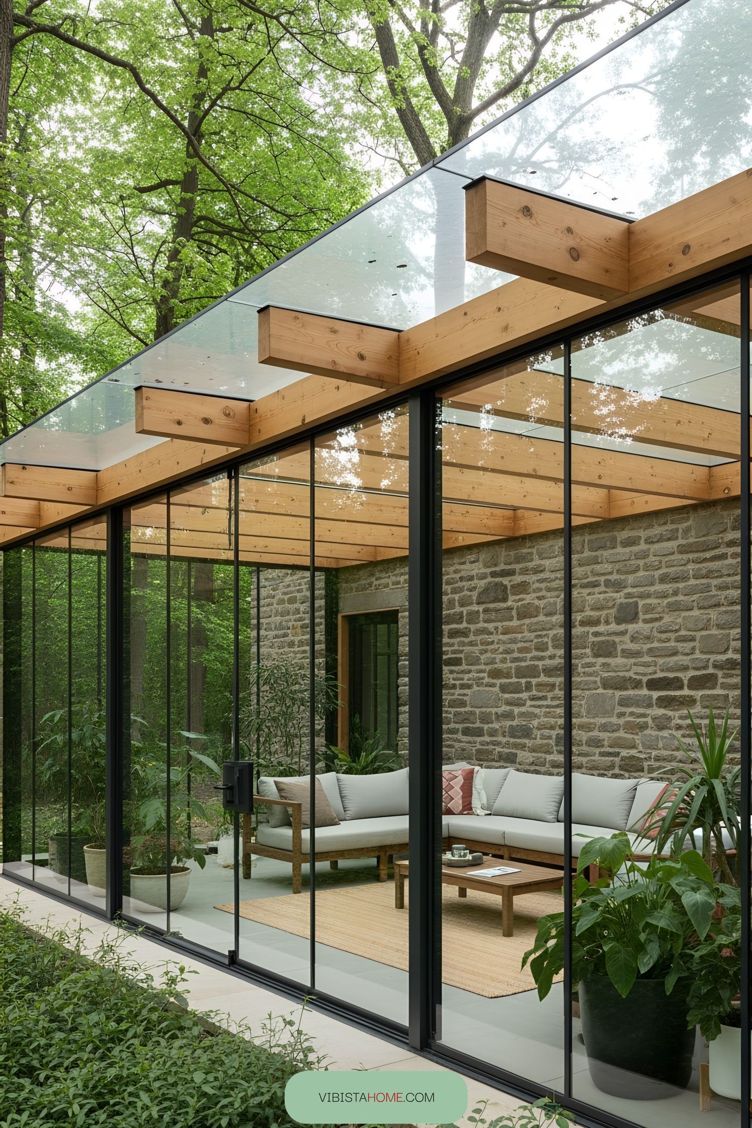 Stylish glass terrace with wooden beams surrounded by greenery