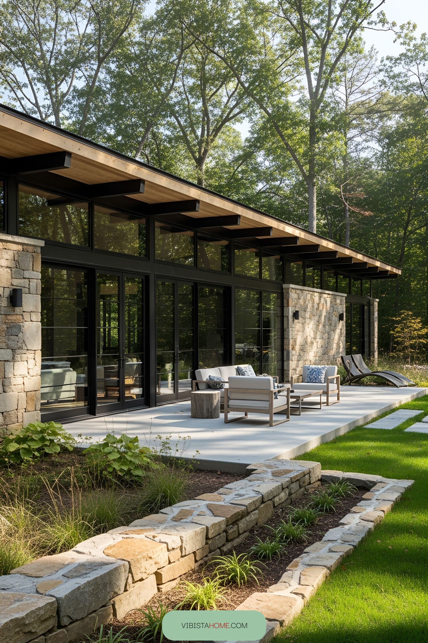 Modern house with stone accents and large glass windows