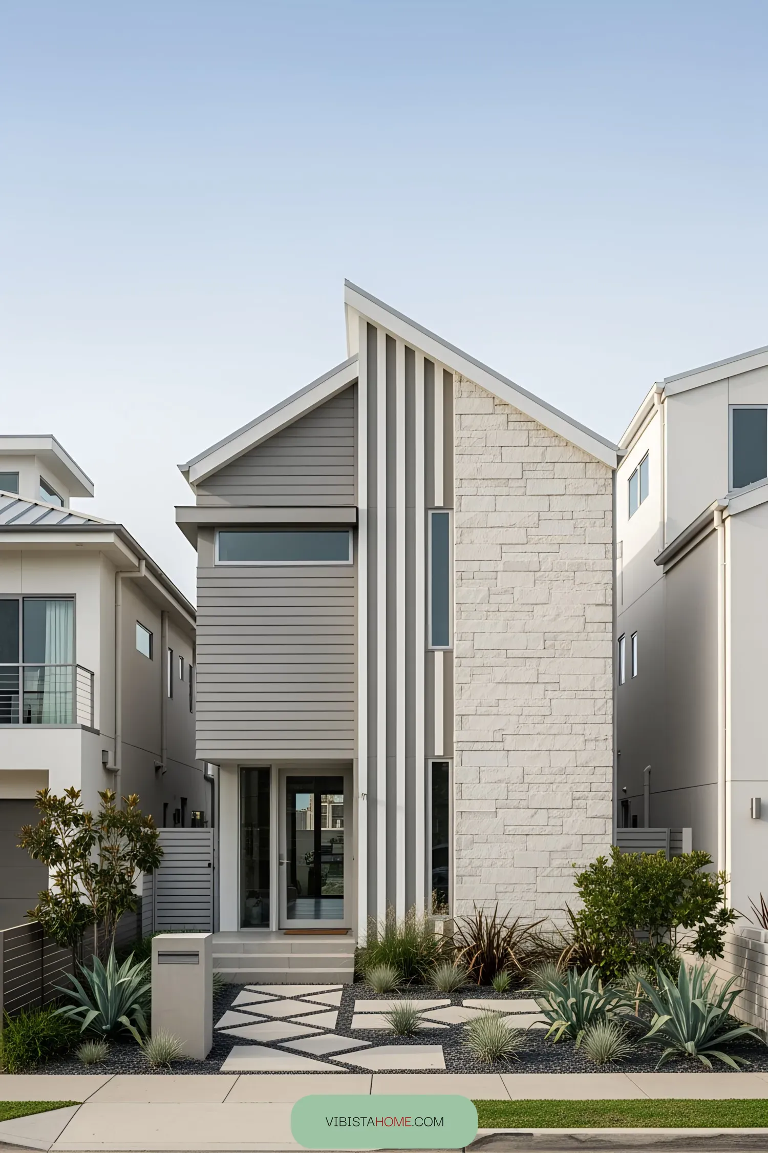 Modern coastal house with sharp angles and stone accents