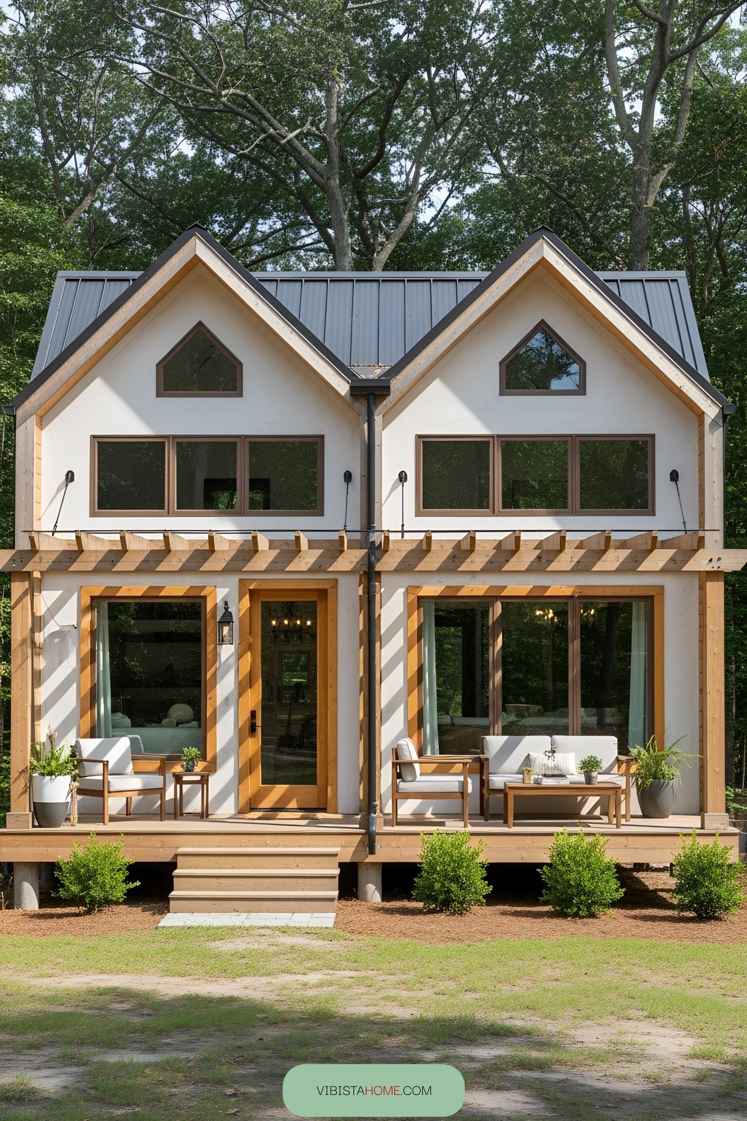 Small modern barndominium with a wooden porch
