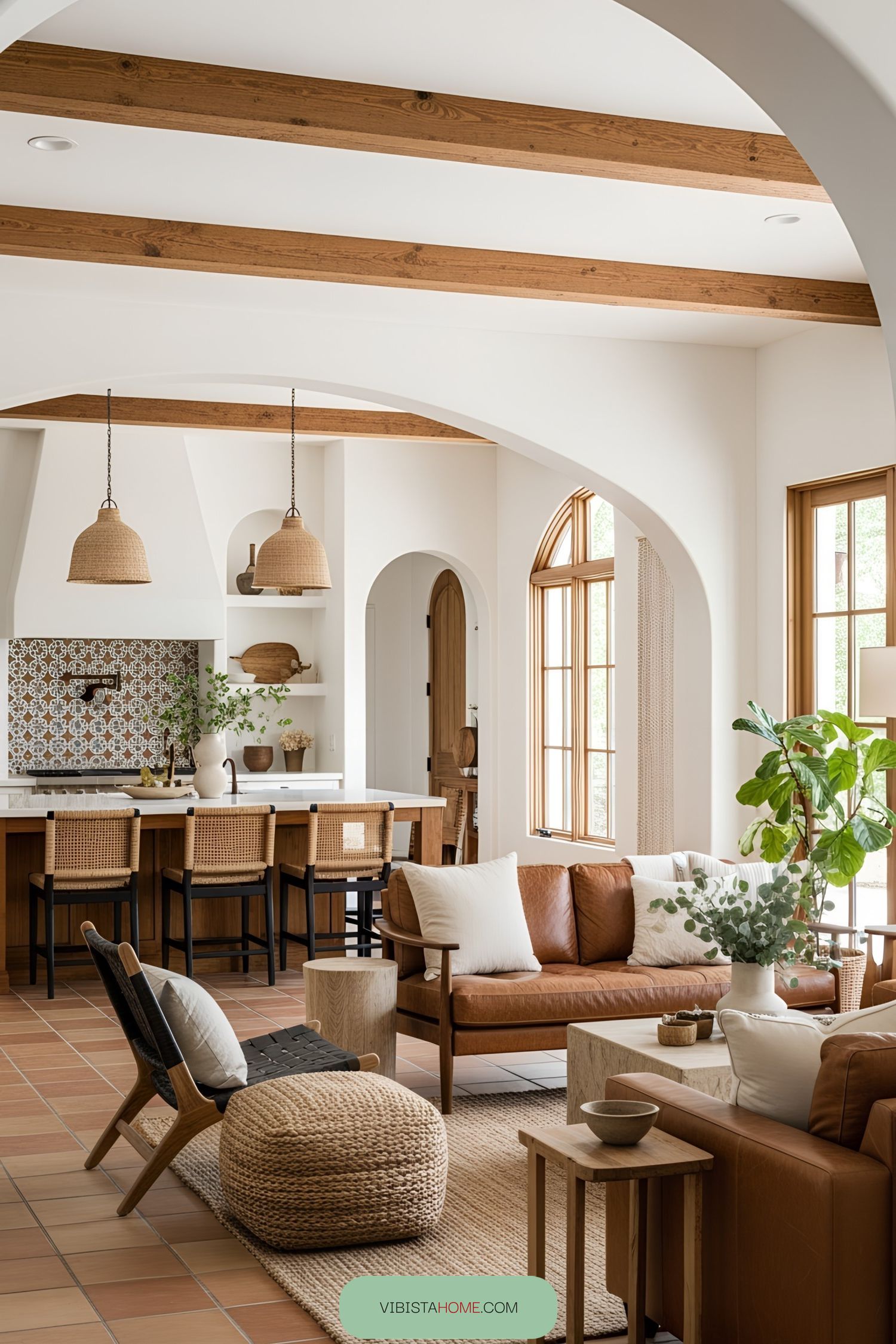 Warm Spanish living room with wooden beams and cozy seating