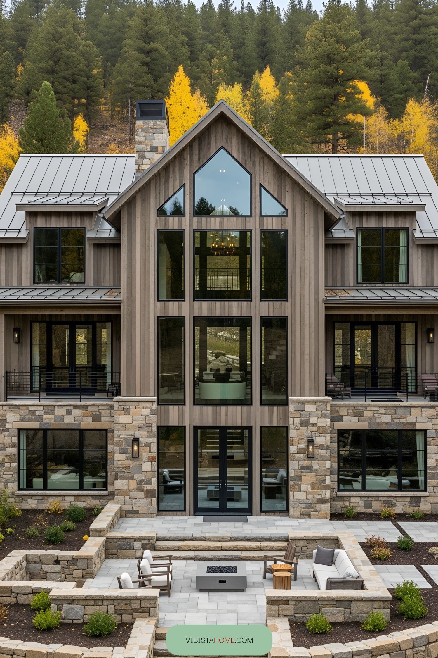 Modern rustic house with stone and wood facade surrounded by trees