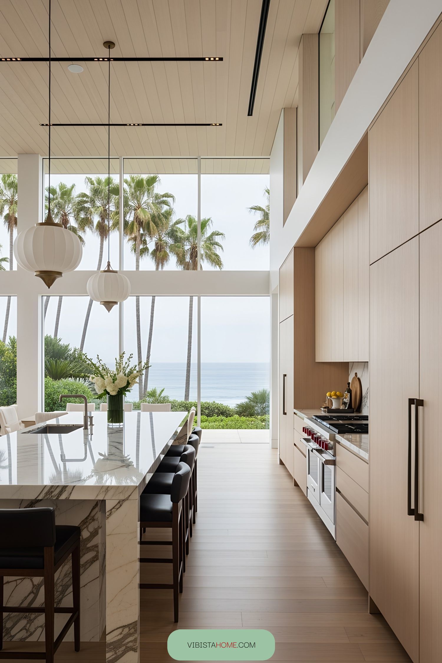 Luxurious kitchen with ocean view and marble island