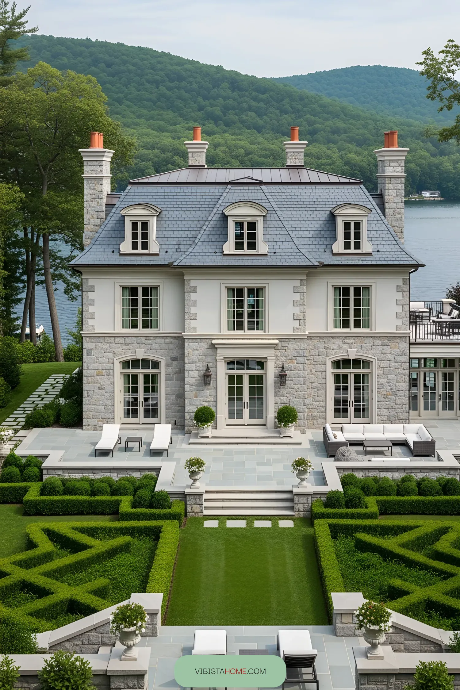Elegant stone mansion by a serene lake