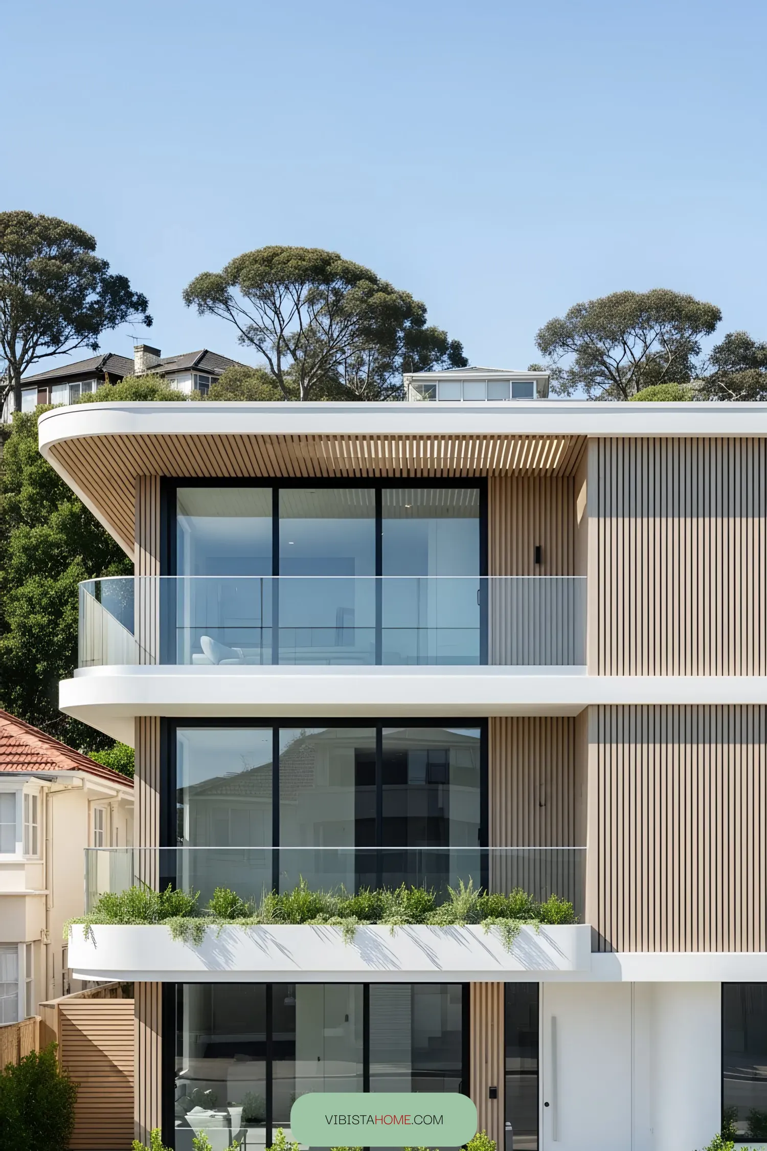 Sleek modern facade with glass balconies