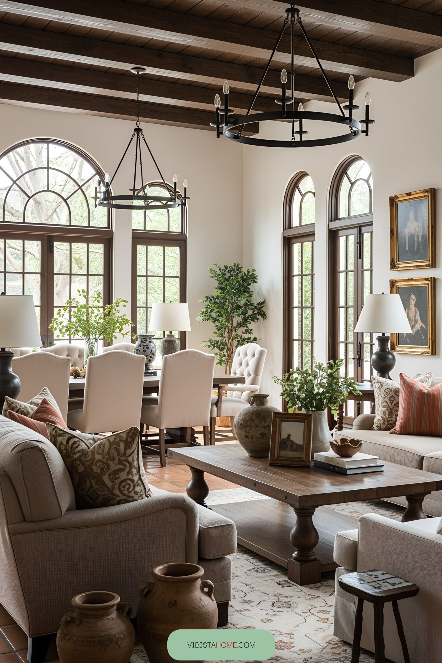 Elegant Spanish-style interior with wooden beams and plush seating