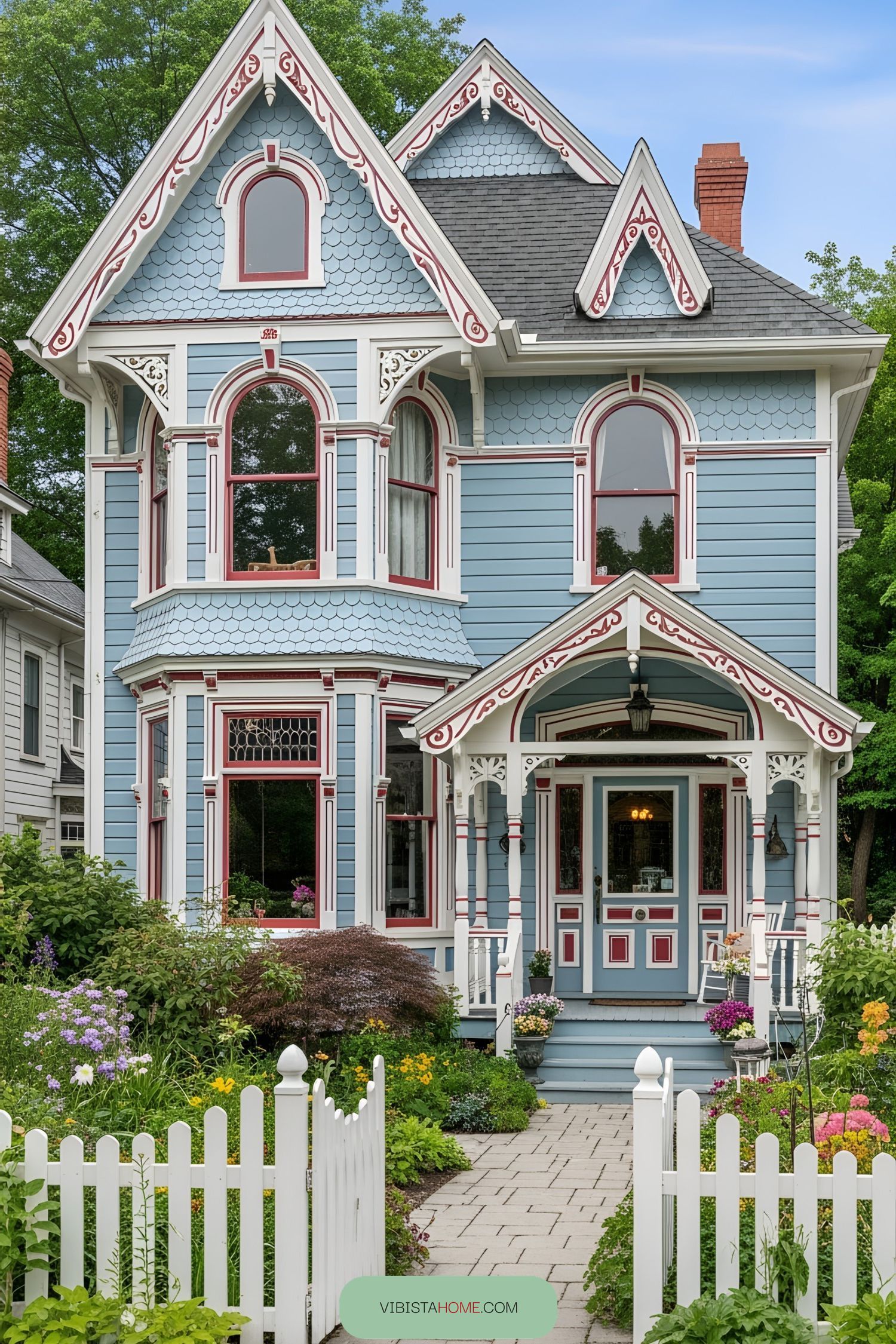 Victorian cottage with ornate details and colorful exterior