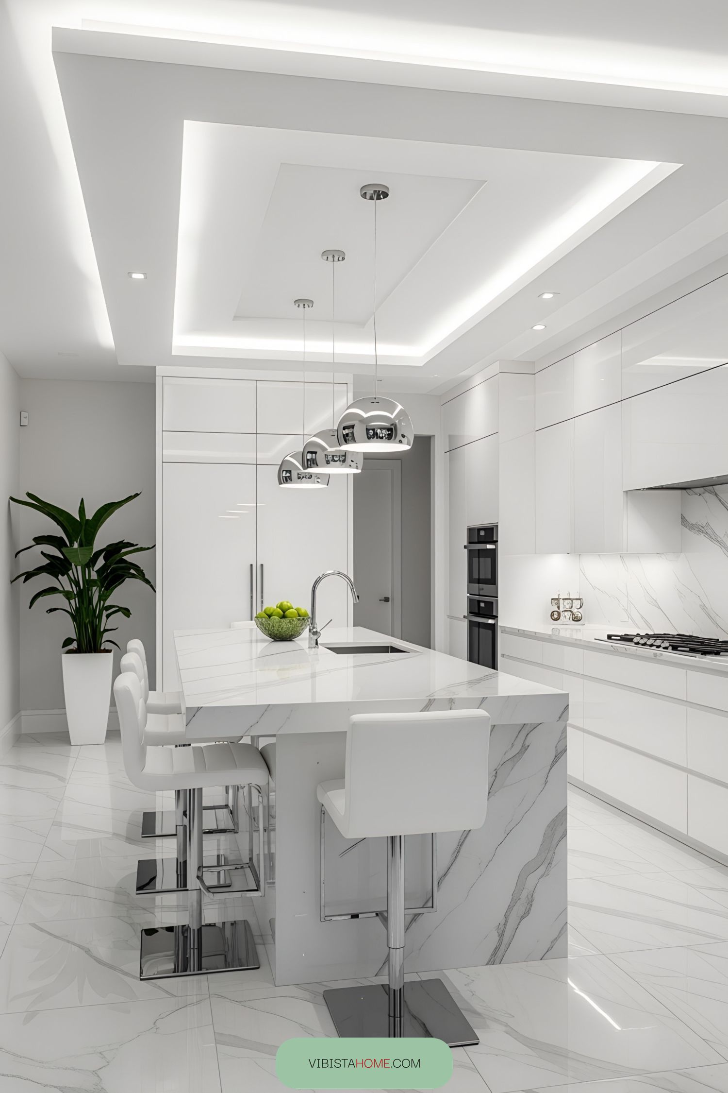 Sleek white kitchen with marble surfaces and shiny lights