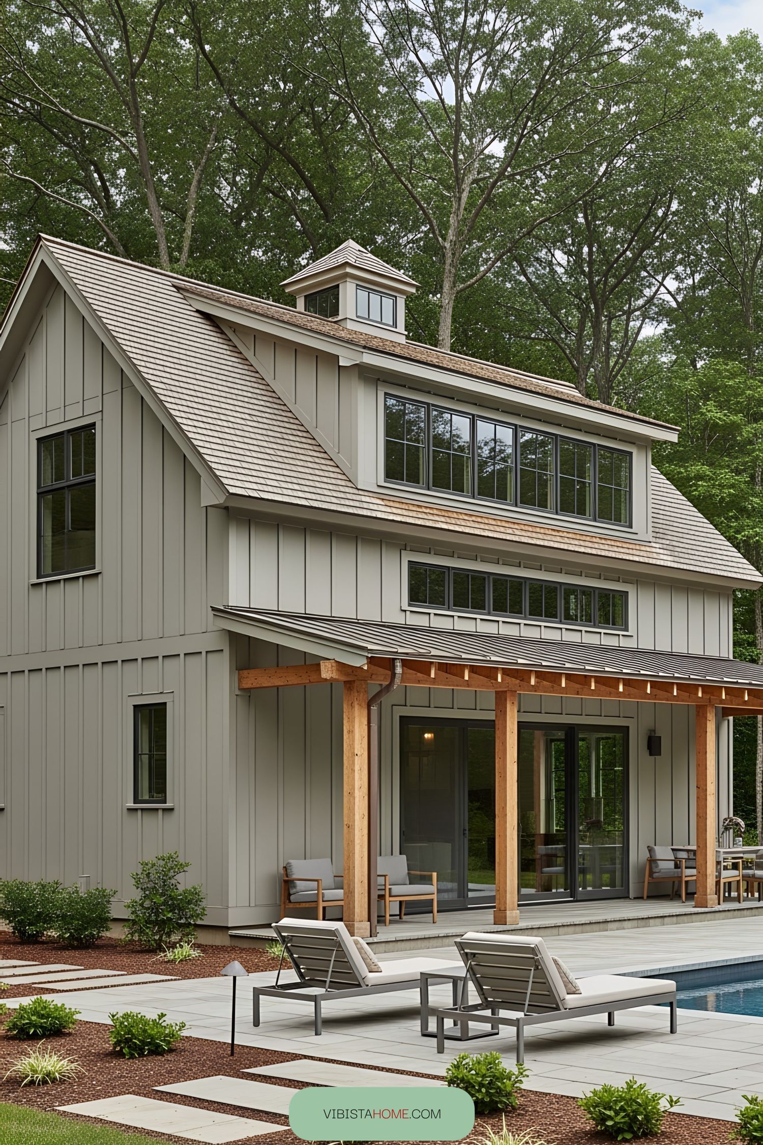 Modern barn-style house with pool and patio