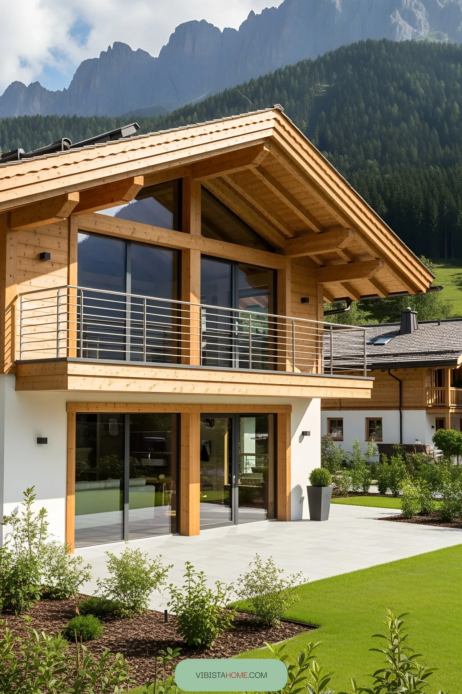 Luxurious wooden chalet with mountain backdrop