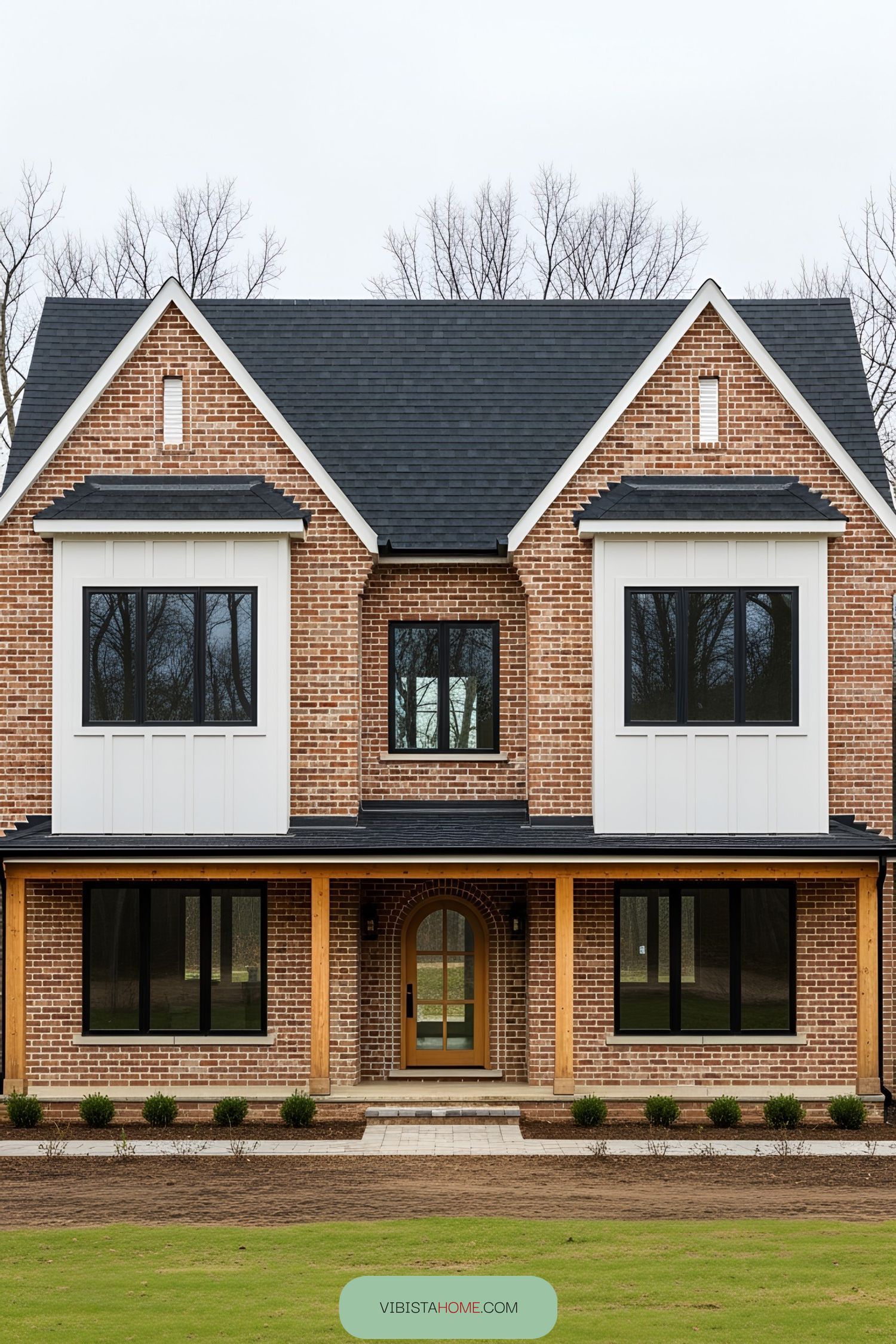 Two-story brick farmhouse with a modern touch