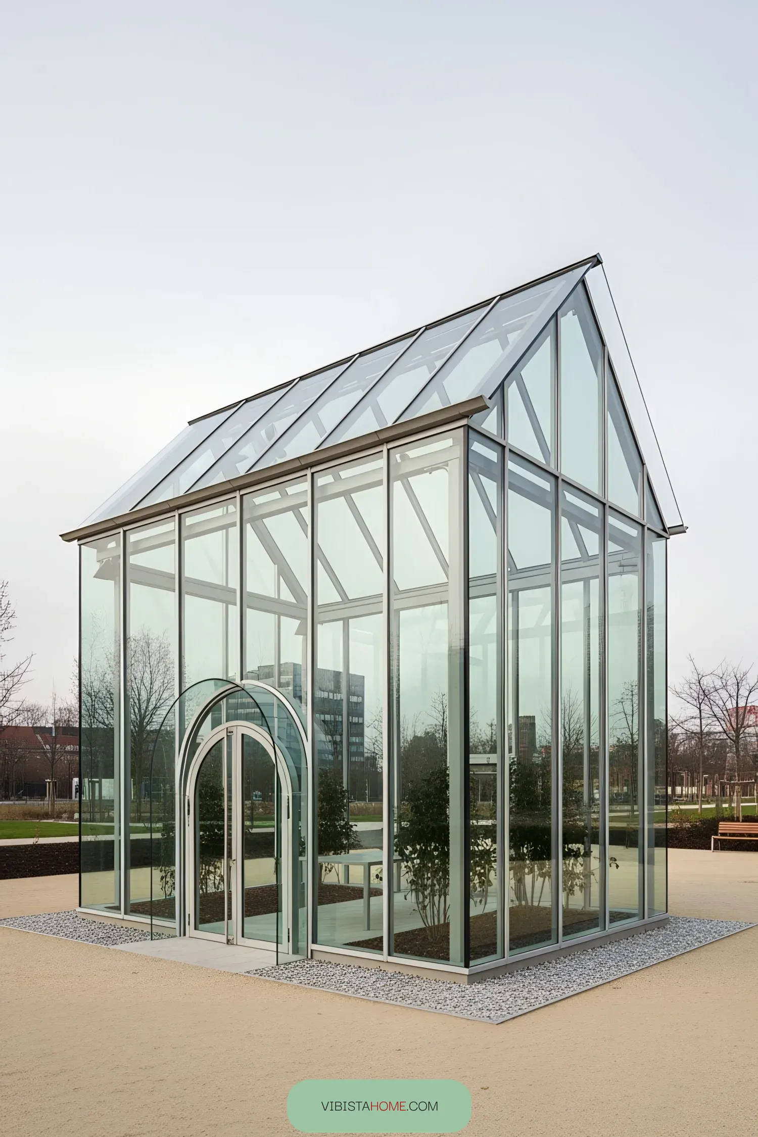 Sleek glass structure with an arched entrance