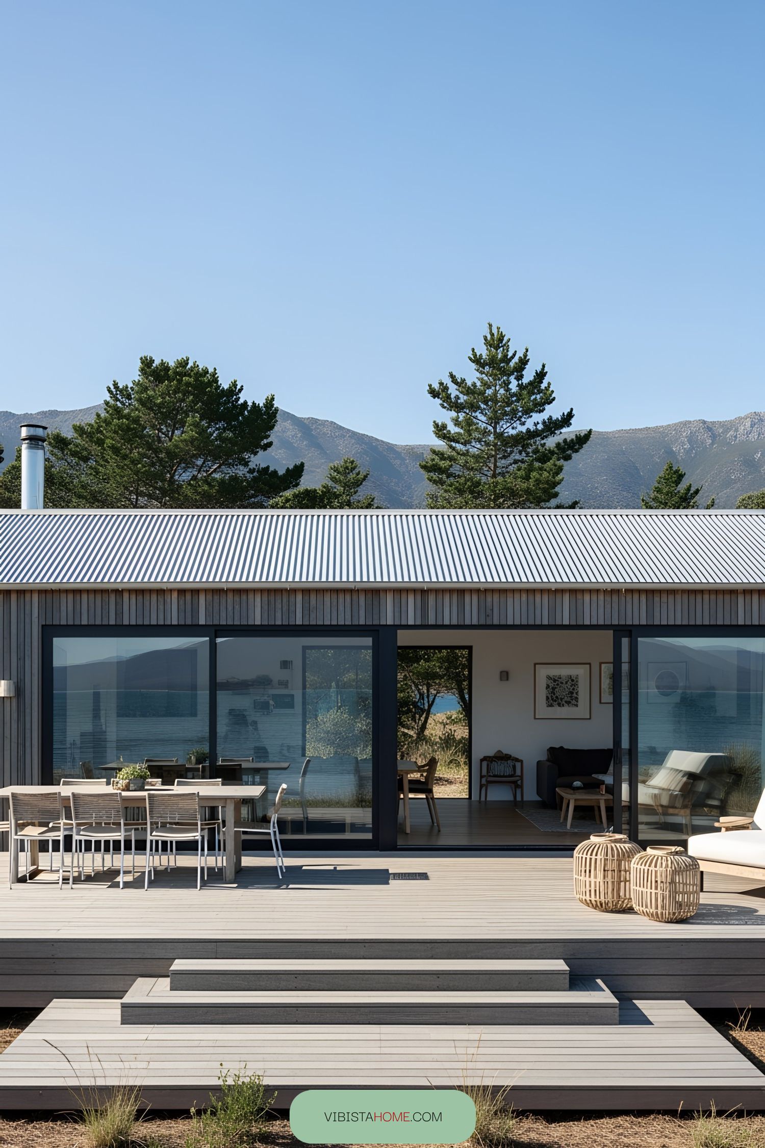 Modern beachfront house with mountain view