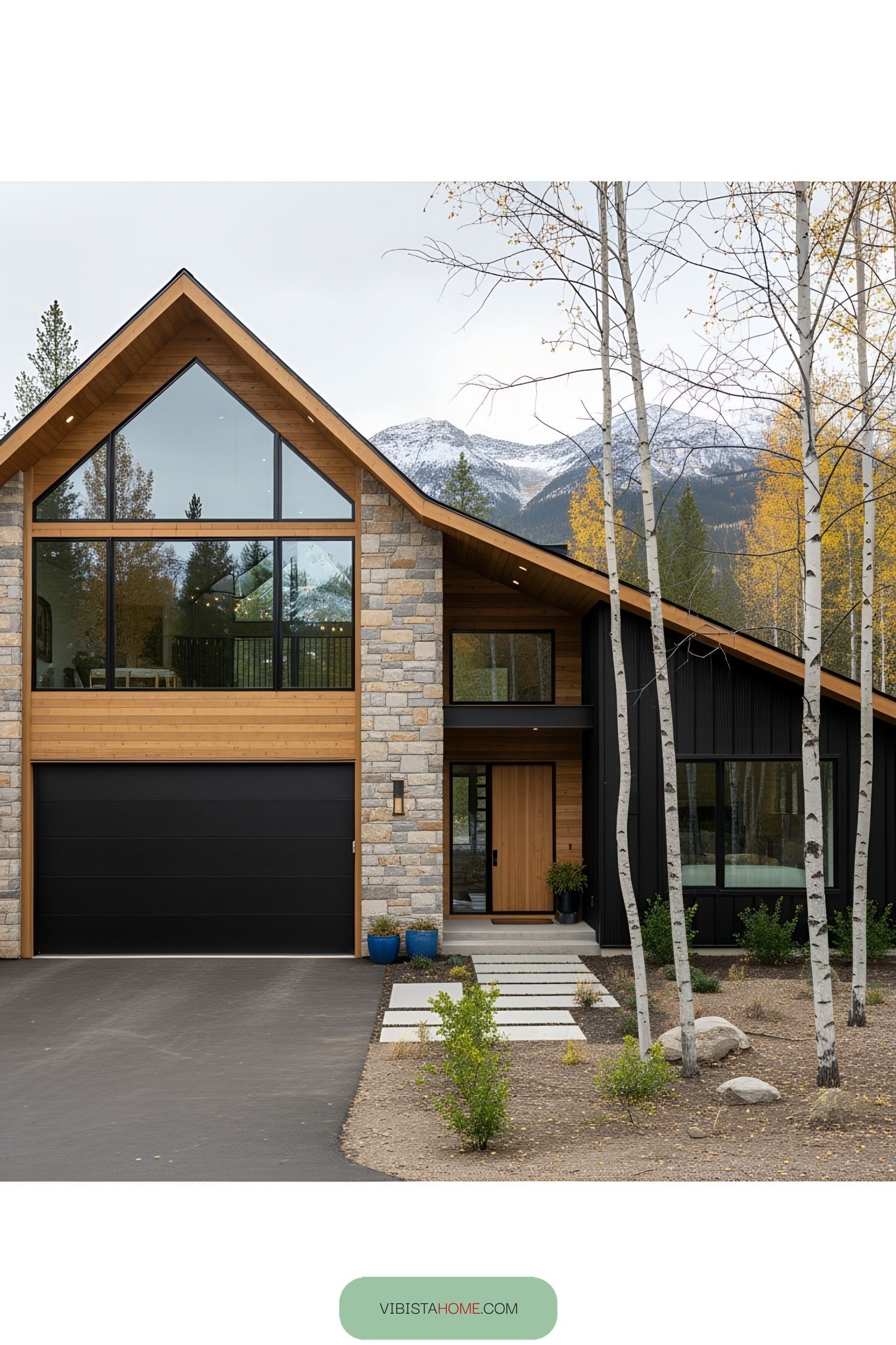Contemporary house with wood and stone exterior