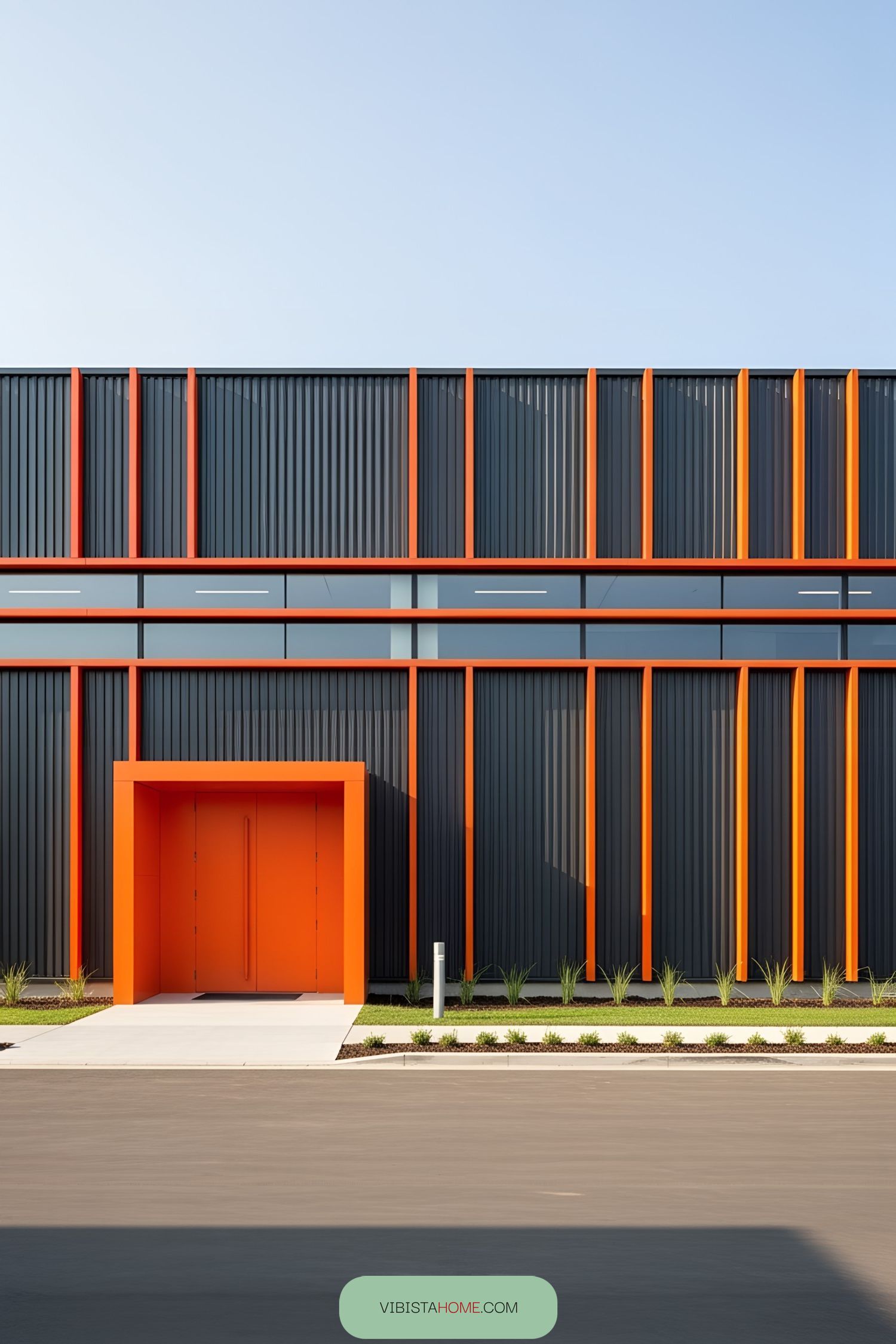 Orange and black industrial building facade with modern design