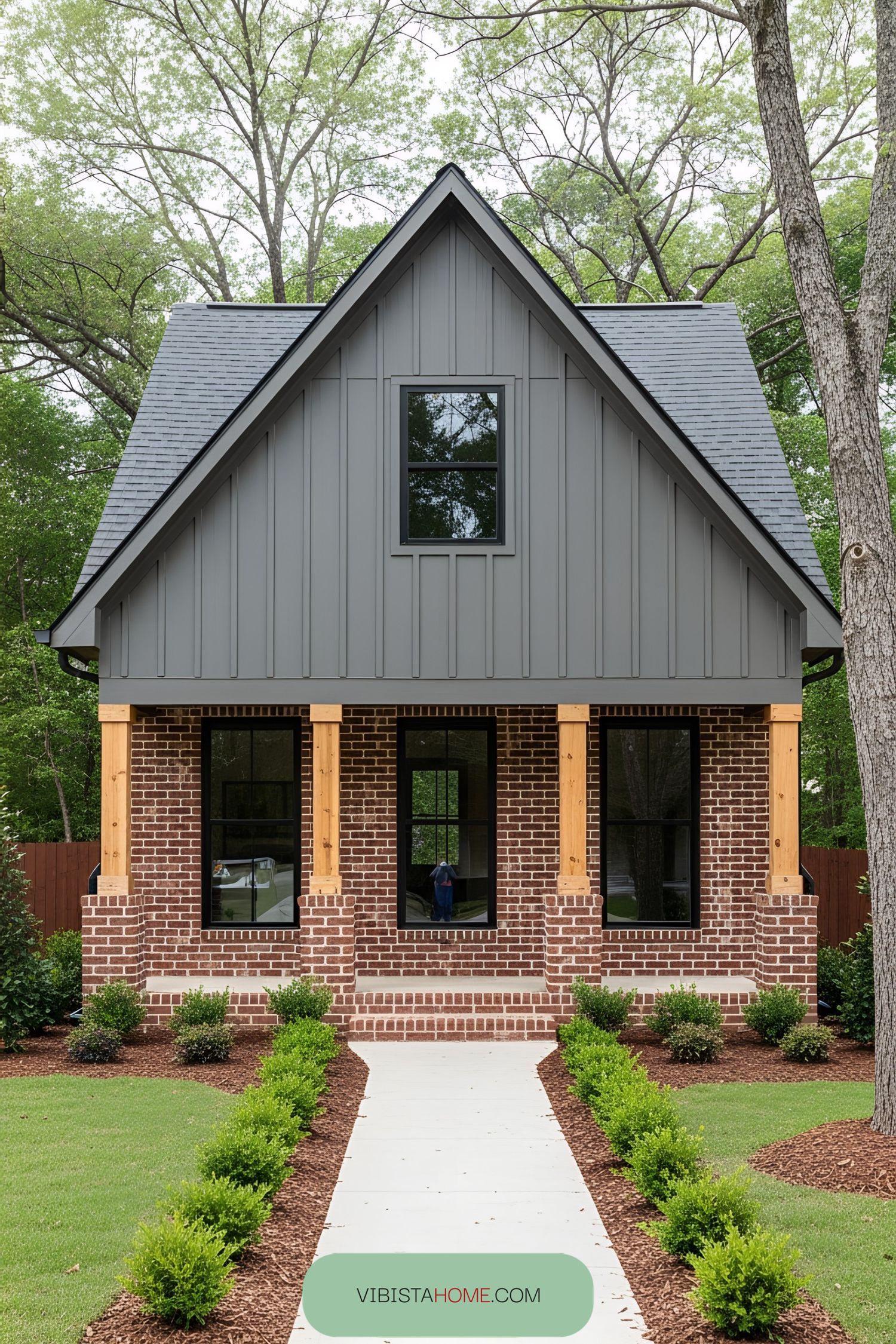 Cottage with brick base and wooden upper section